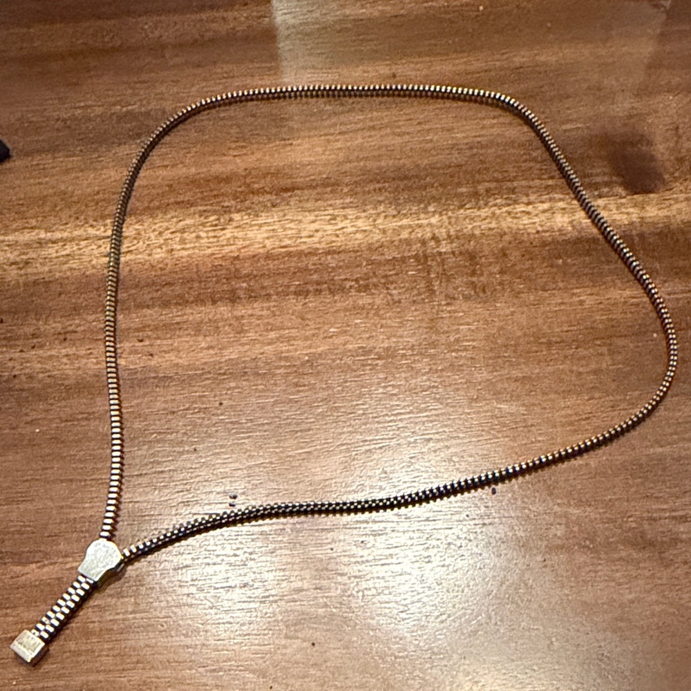 MAC Cosmetics employee-only zipper necklace